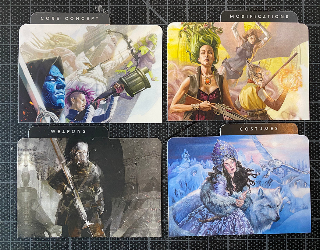 An image showing the exclusive illustrations on the category dividers, by artists Clark Huggins, Richard Anderson, and Jennifer Lesser