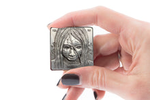 Load image into Gallery viewer, An image of the face side of the Reckless Deck Horror and Urban Fantasy Coin